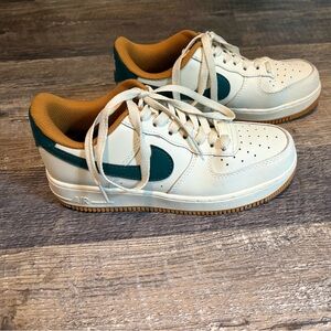 Nike AirForce 1 Low-Top Sneakers in Cream, Dark Green & Mustard